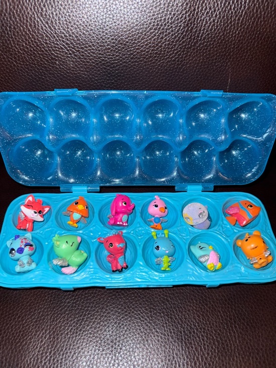 Hatchimals Other - Hatchimals Blue Egg Carton Case with 12 Colorful Mini Animal Figures.